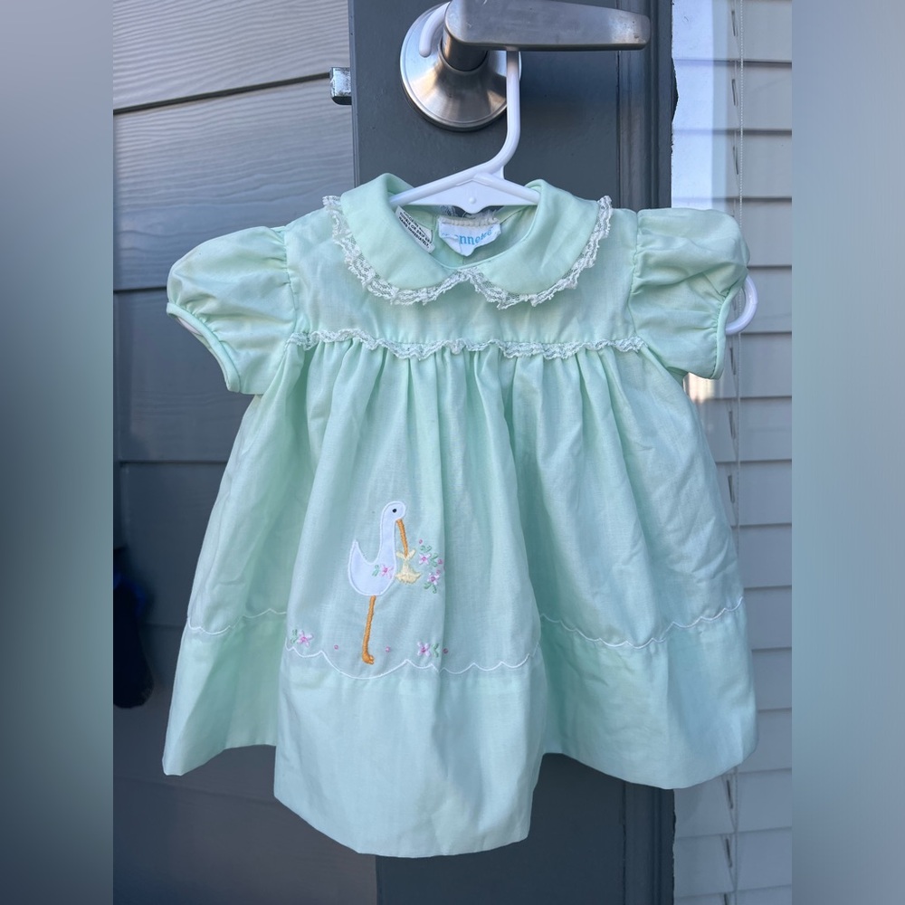 Vintage Nanette baby gown in soft green with stork embroidery